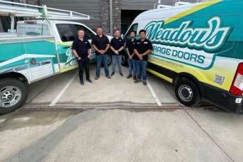Trusted Garage Door Contractors Posing for a Company Picture