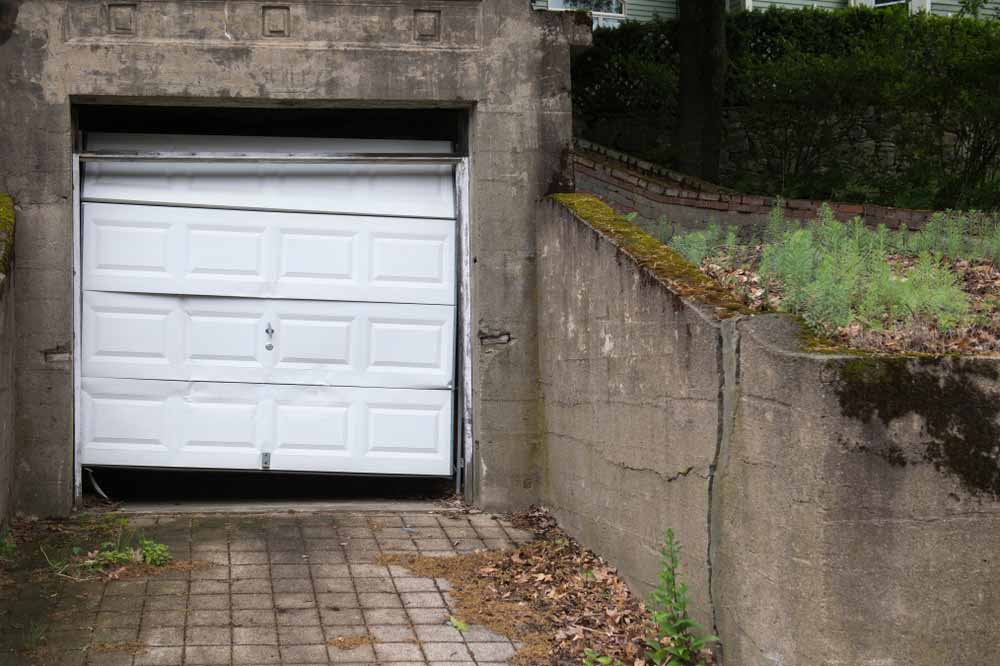 Why Prompt Repairs on Your Garage Door Spring Should Be A Priority