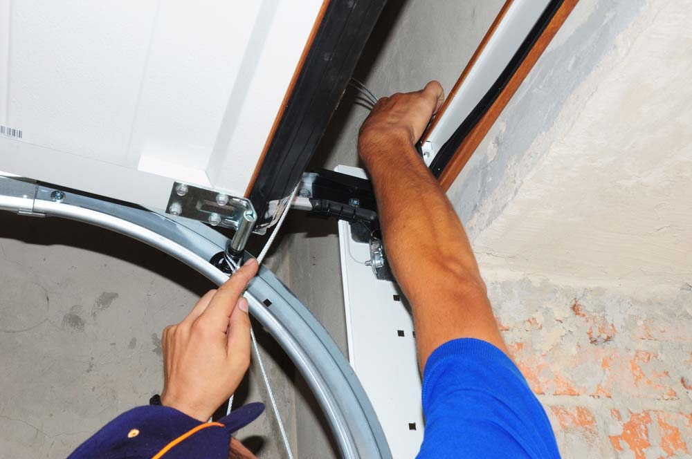 Do You Need To Repair Or Replace The Garage Spring Door?