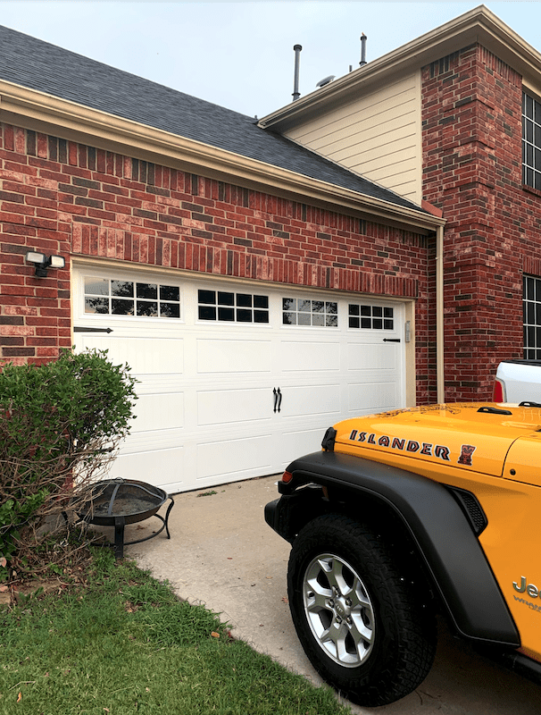 Long grooved Panel with stockton windows by Doorlink Ft Worth Tx